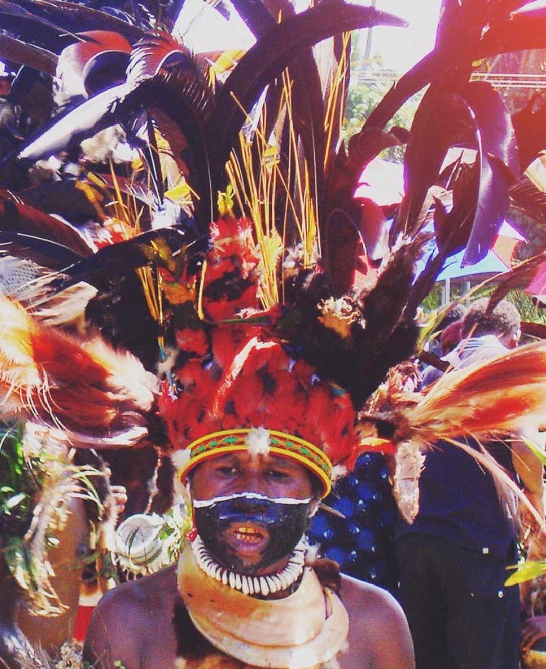 Woman in traditional dress at a sing sing in papua new guinea by Dr Zoe Norridge