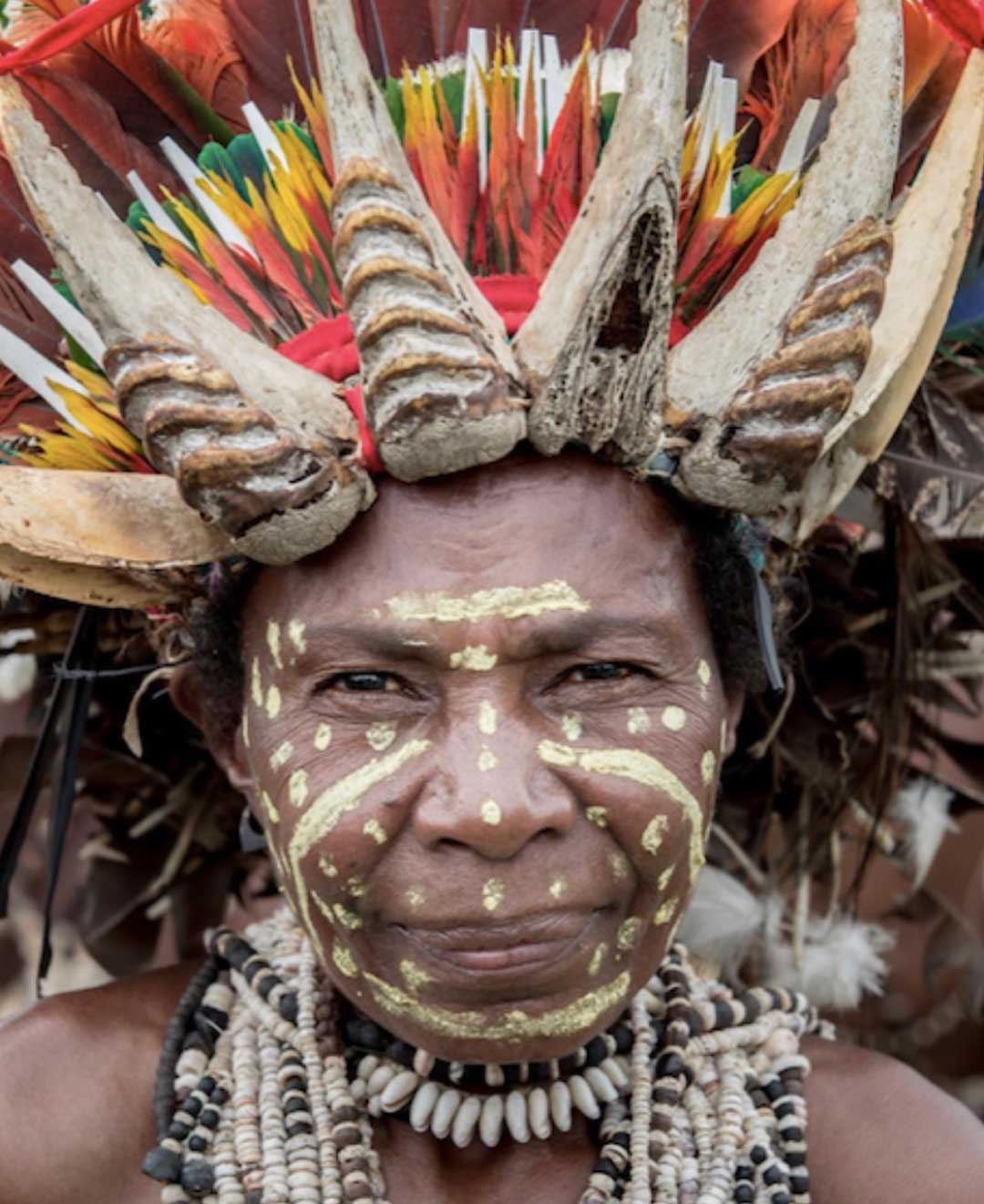 Papua New Guinean woman in her traditional bilas and cultural dress