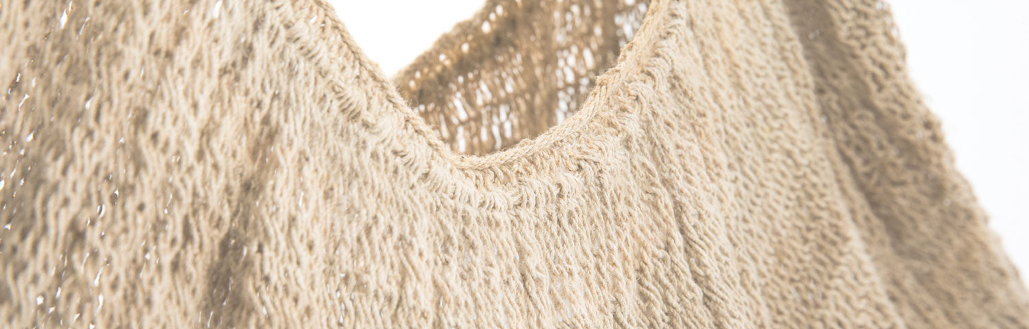 Details of the opening of a natural fibre bilum from papua new guinea