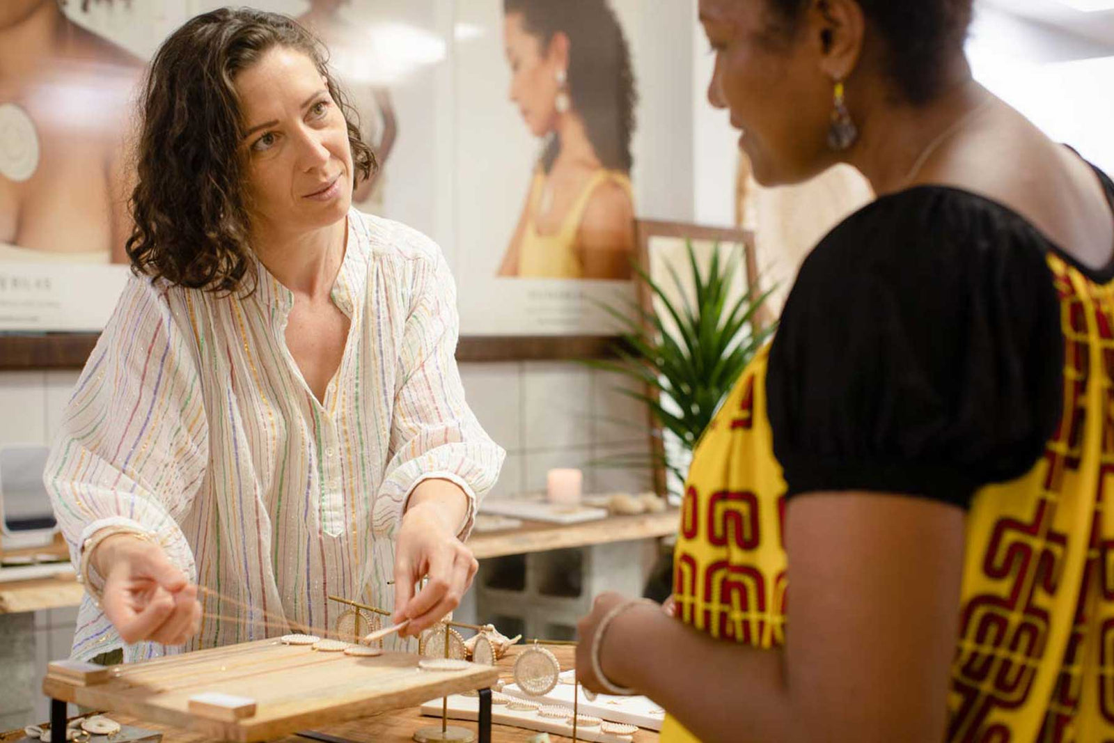 Jess and maureen working together in the bilum and bilas studio in port moresby