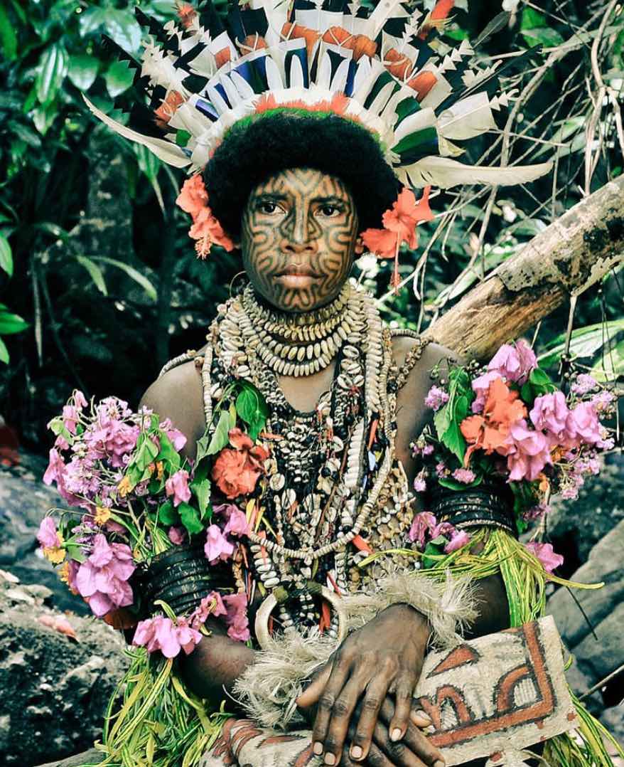 Oro Province portrait of a young girl in traditional dress from Oro in Papua New Guinea by David Kirkland