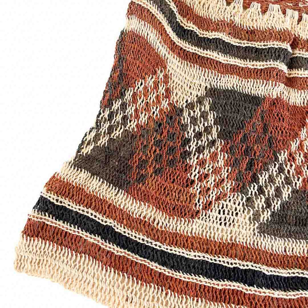 Corner close up on a brown tone patterned natural bilum.