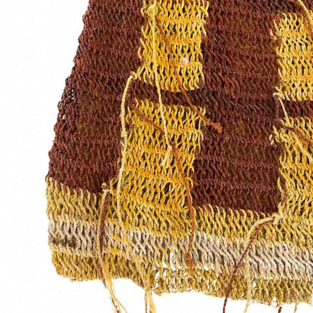 Corner close up on yellow and brown pattern fibre bilum.