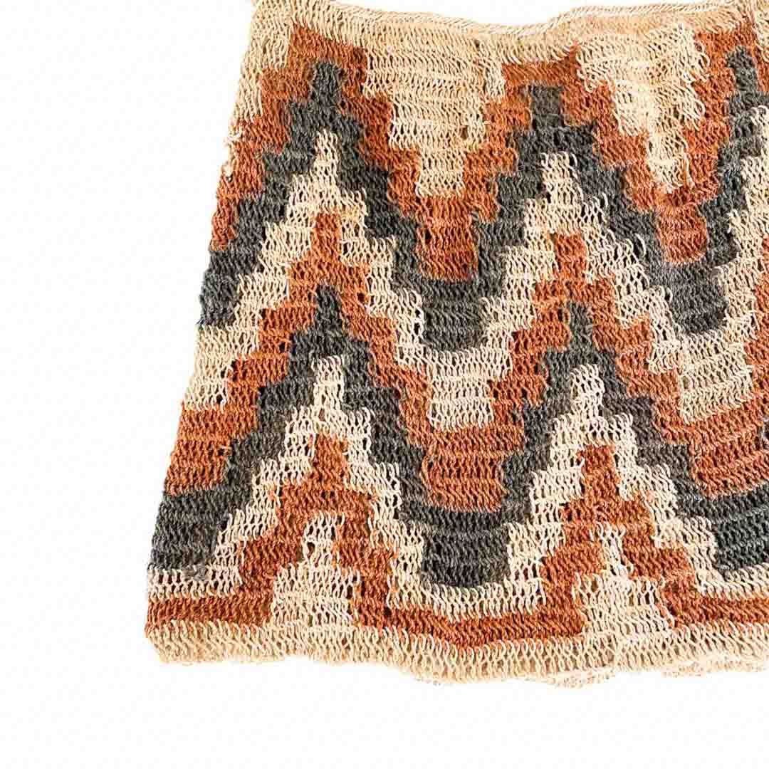 Close up on corner of diamond pattern natural fibre bilum