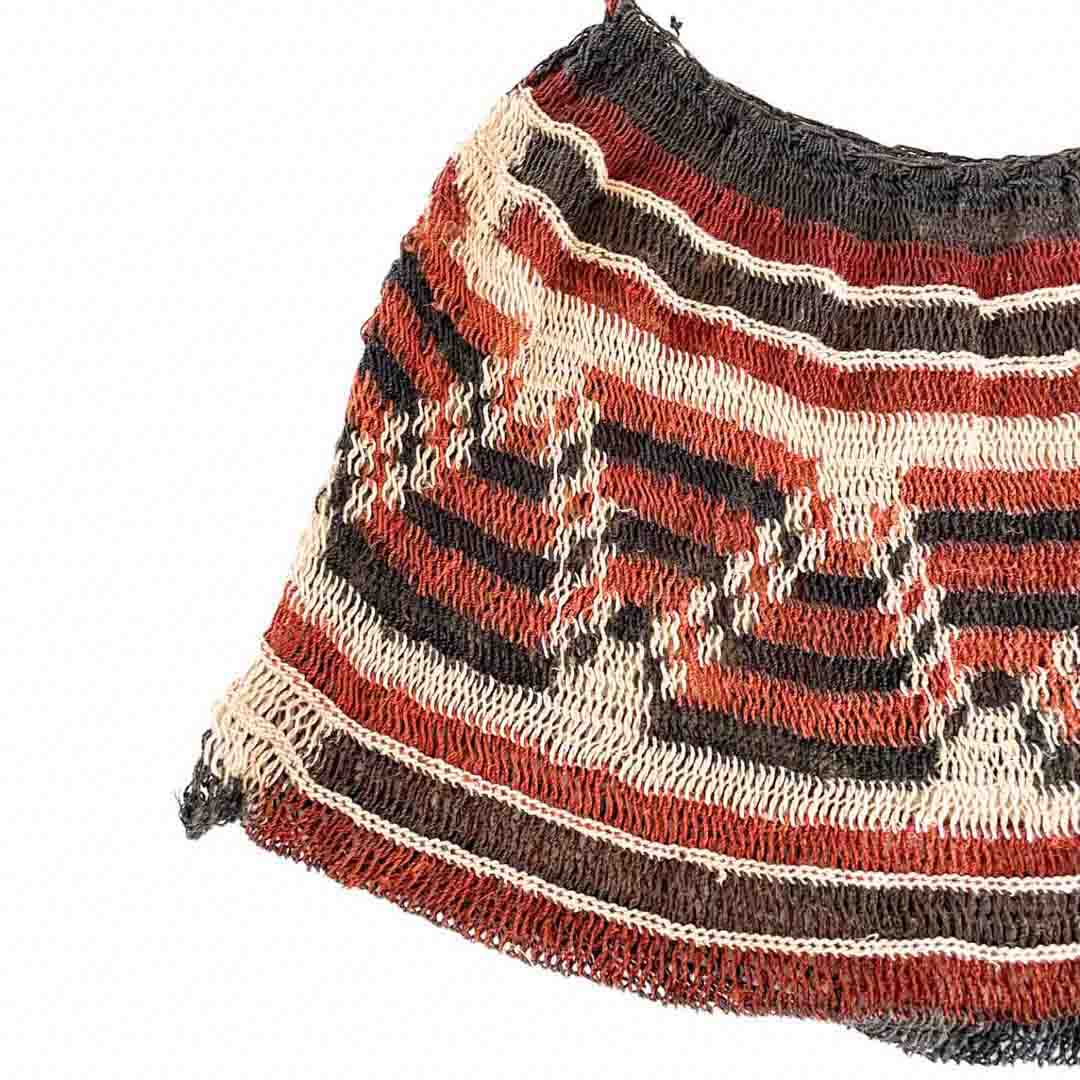 Corner close up on dark toned pattern natural bilum