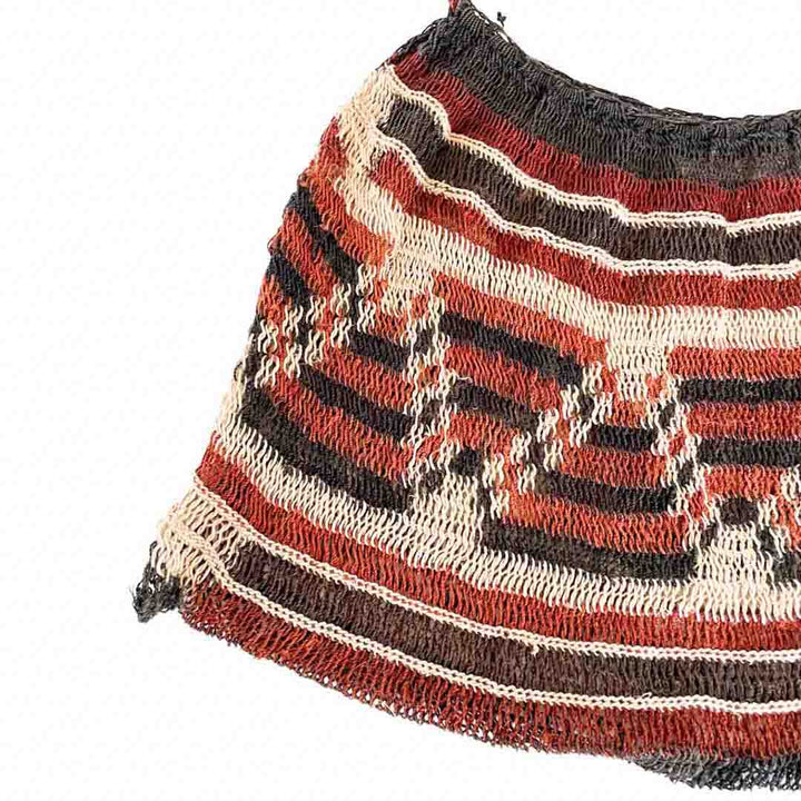 Corner close up on dark toned pattern natural bilum