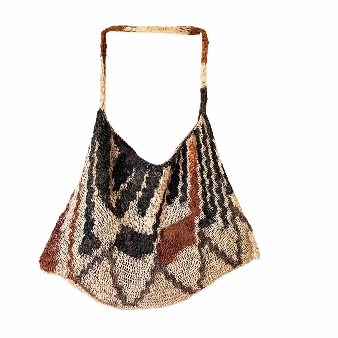Multicoloured earth tone natural bilum hanging.