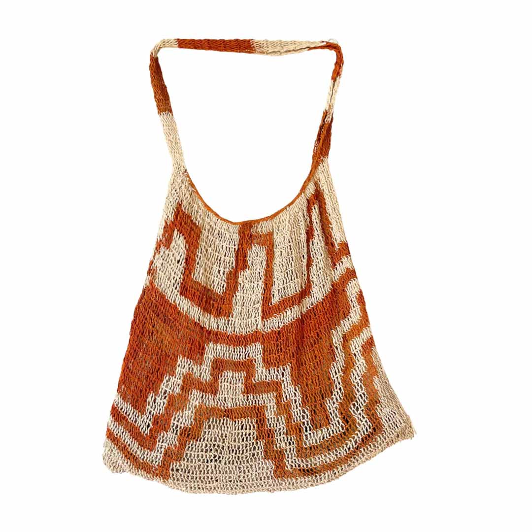 Burnt orange and white natural fibre bilum displayed.