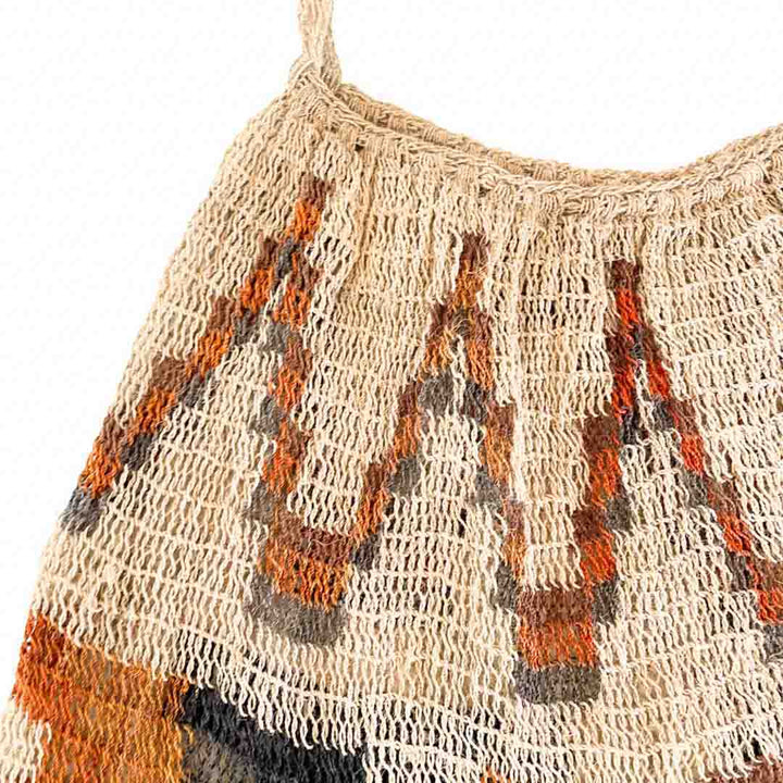 Multi-patterned natural fibre bilum close up on the weave.