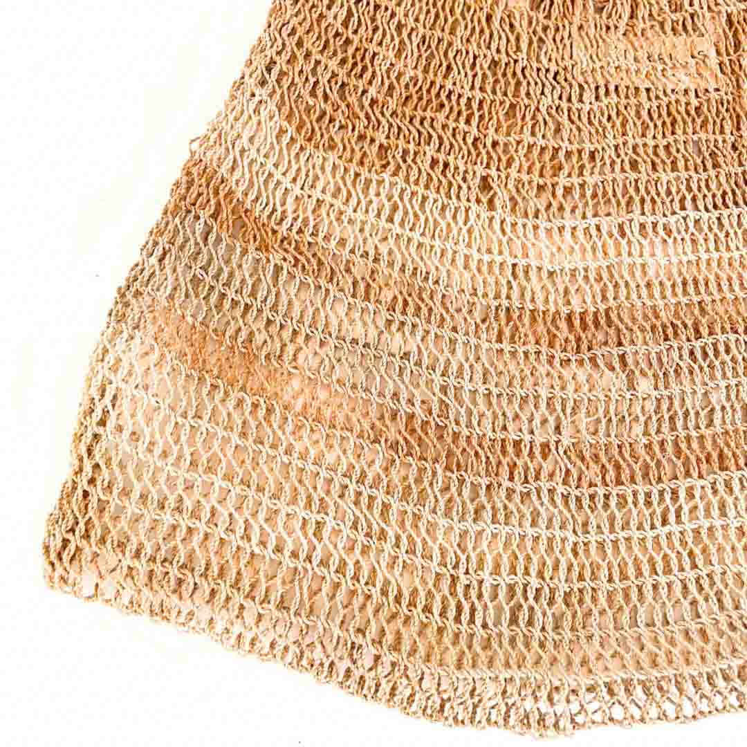 Corner close up on a natural fibre plain billm.