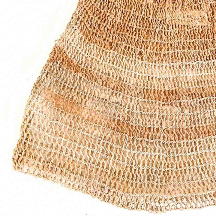 Corner close up on a natural fibre plain billm.