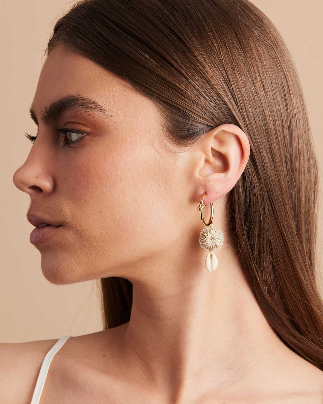 Model wearing Bilum and Bilas Eternal Breeze Hoop Earrings side profile