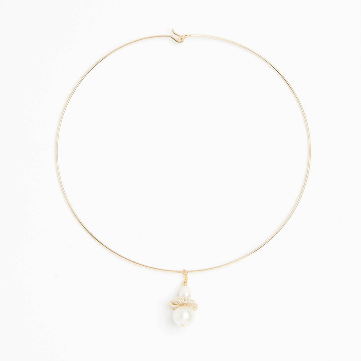 Full view of gold filled choker with pearl and woven natural fibre disc #Gold