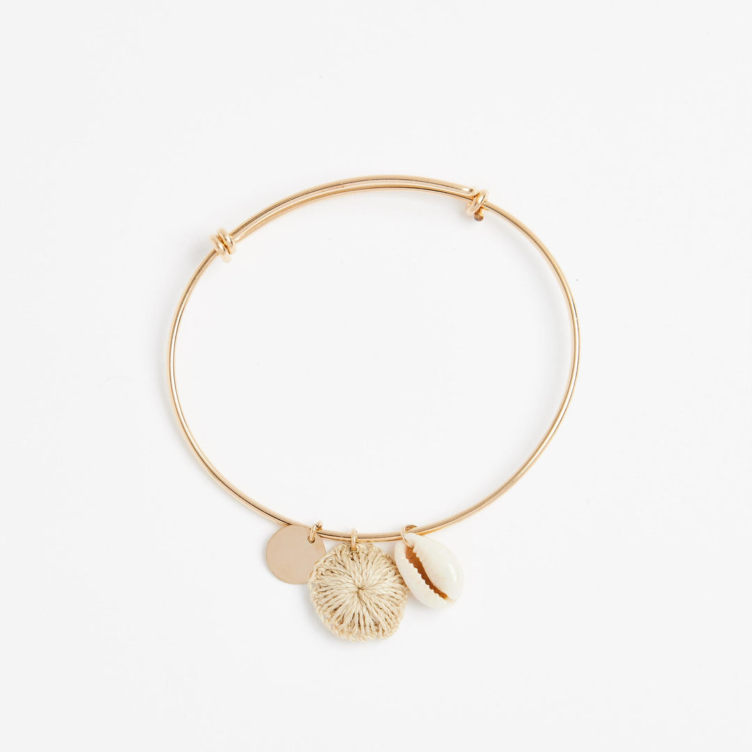 Bilum and Bilas gold filled adjustable bracelet with shell and natural fibre charms front view