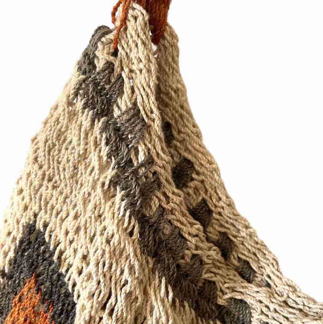 Detail shot on opening of a traditional string bilum from Papua New Guinea.