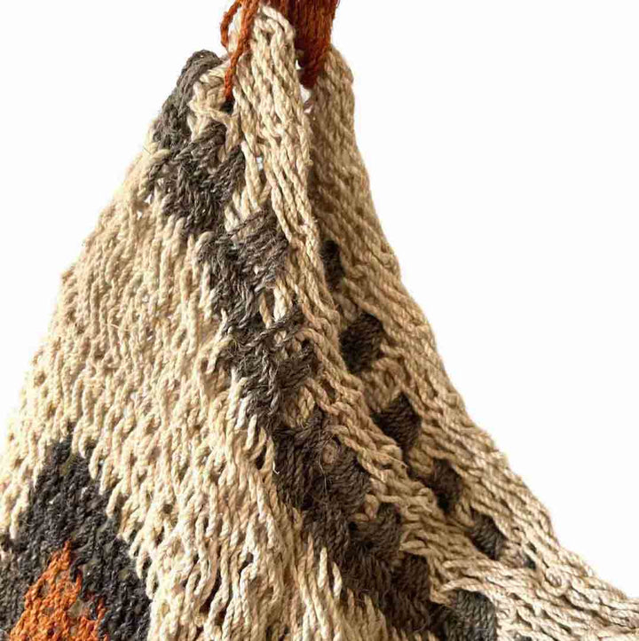 Detail shot on opening of a traditional string bilum from Papua New Guinea.
