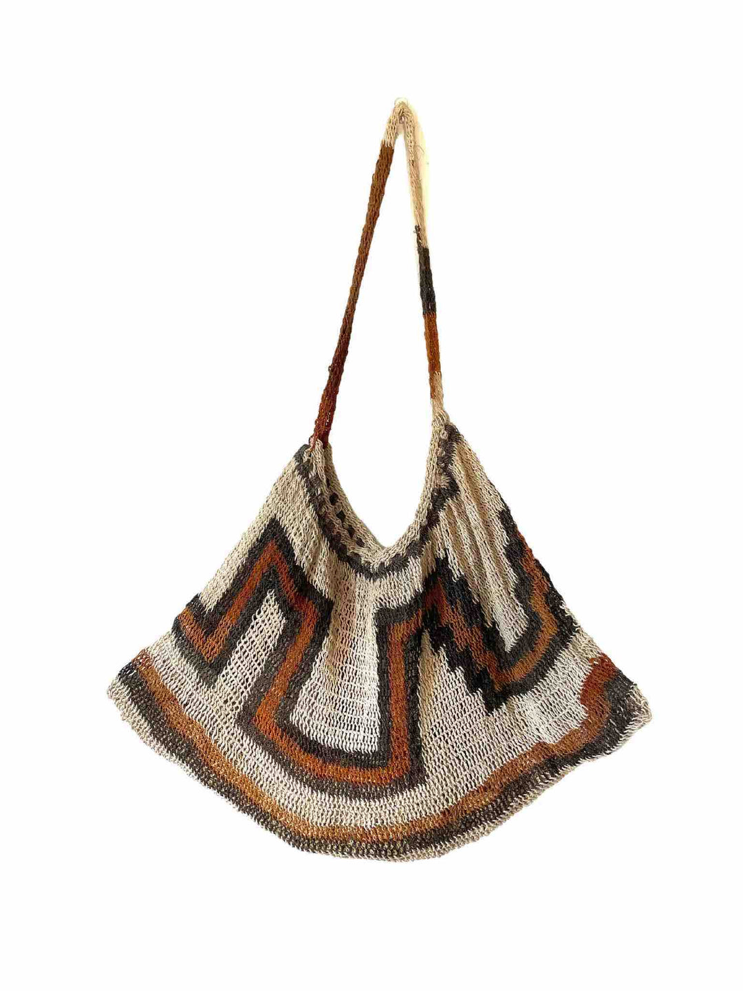 Traditional string bilum in earth tones hanging on a white background.