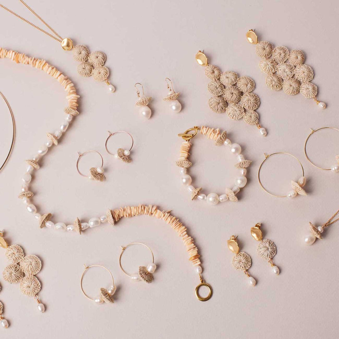 Pearl stack necklace in collection flat lay