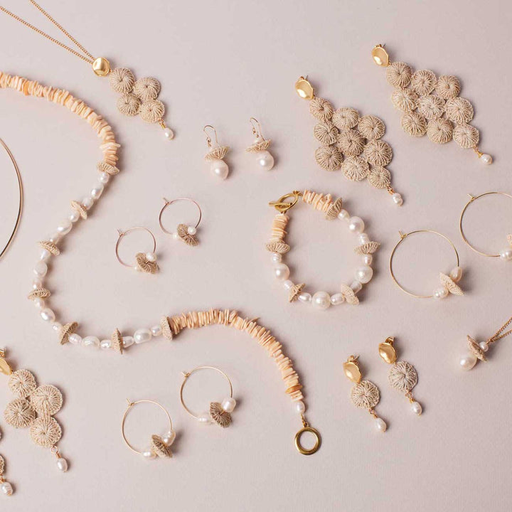 Pearl stack necklace in collection flat lay