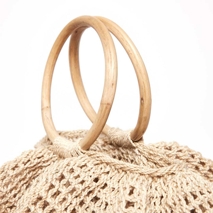 Ripple basket natural cane handle details.