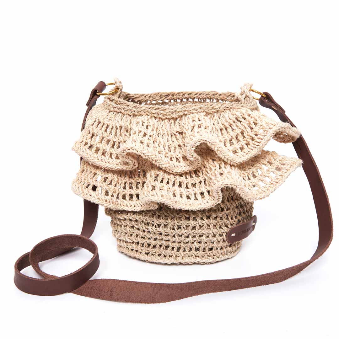 Standing image of Ripple cross body bag in natural.