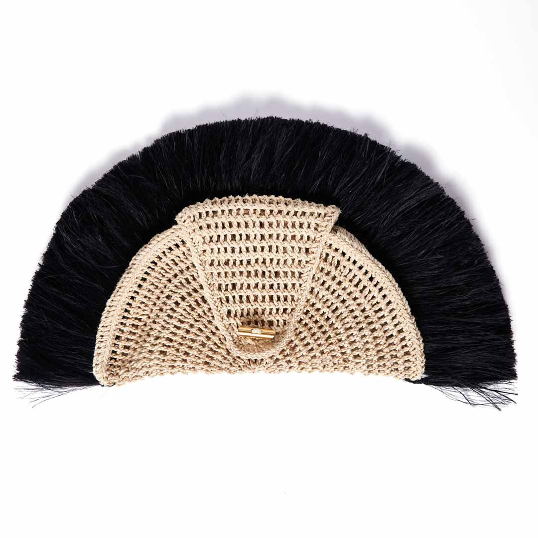 Back of the black Sing Sing clutch bag with tassels.