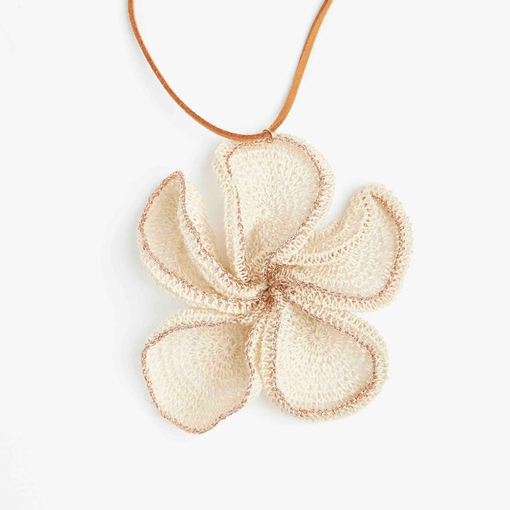 Natural fibre and metallic rose gold woven flower pendant.