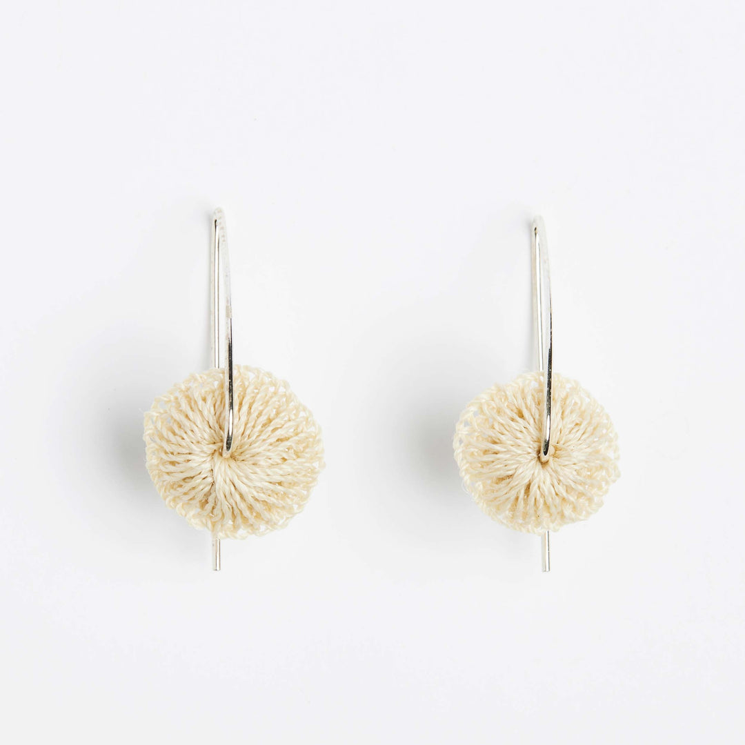 Front view of Bilum and Bilas sterling silver ear wires with handwoven textile bead detail
