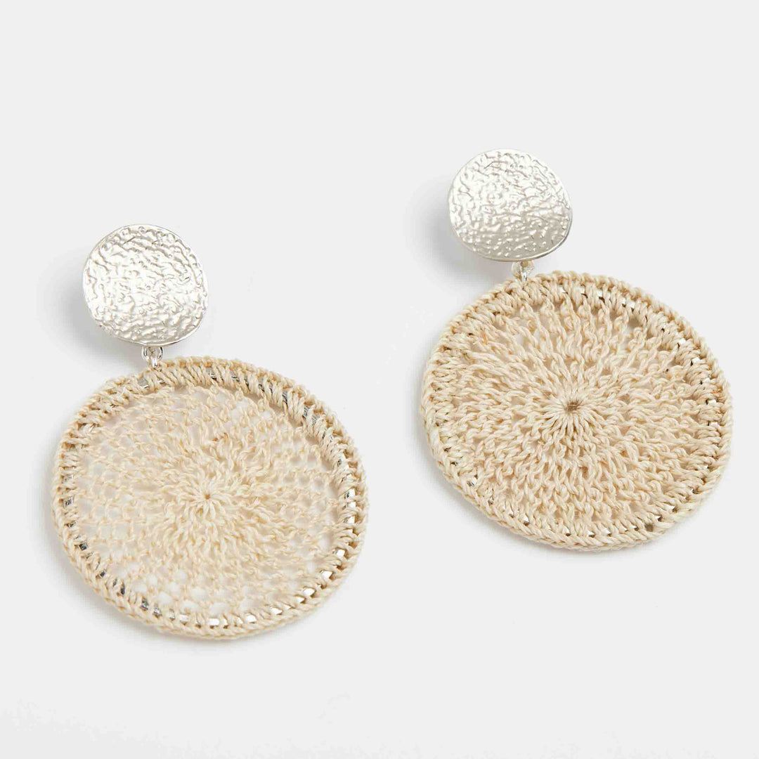 Bilum and Bilas natural fibre and silver disc boho earrings view on angle