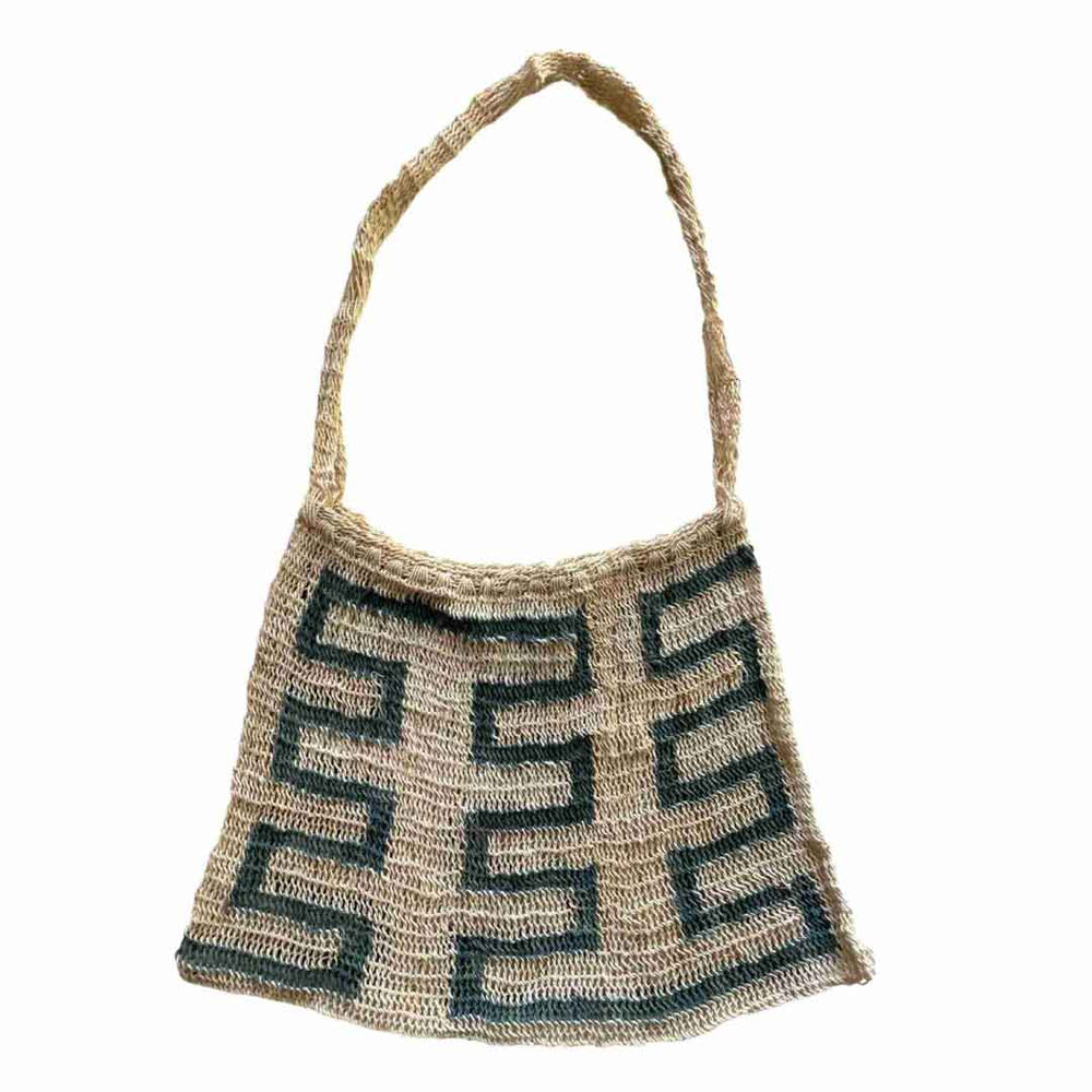 Flat lay picture of green lines patterned Umboldi Village string bilum.