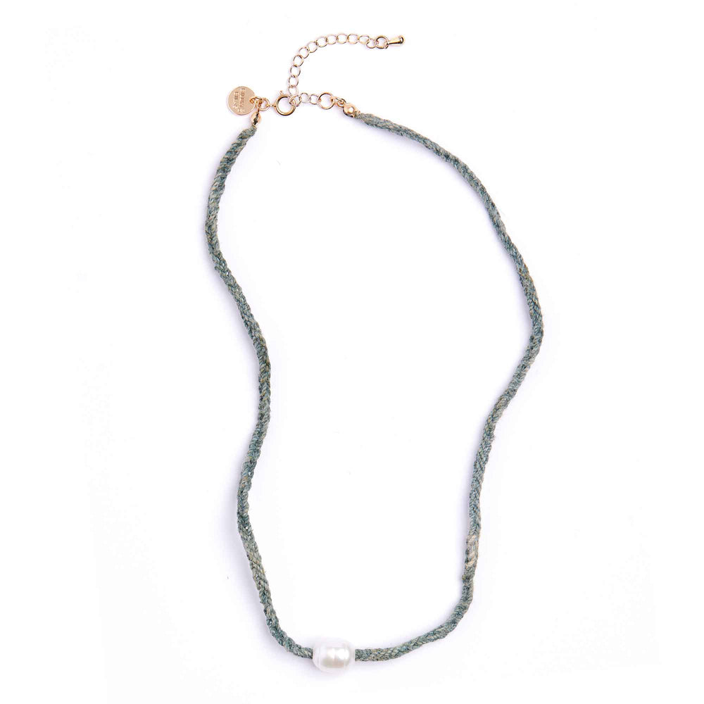 Necklace with a pearl pendant on a white background