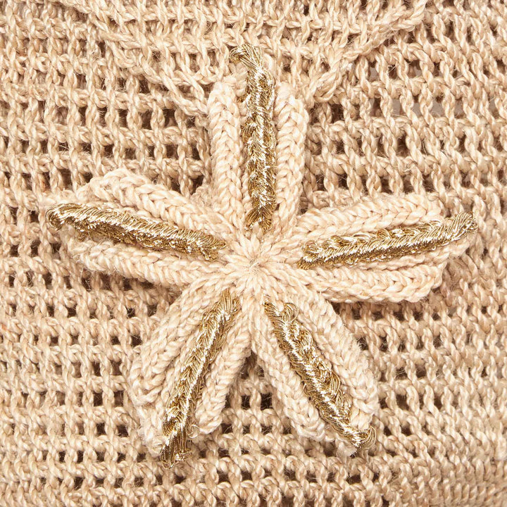 woven starfish clasp on handwoven bag
