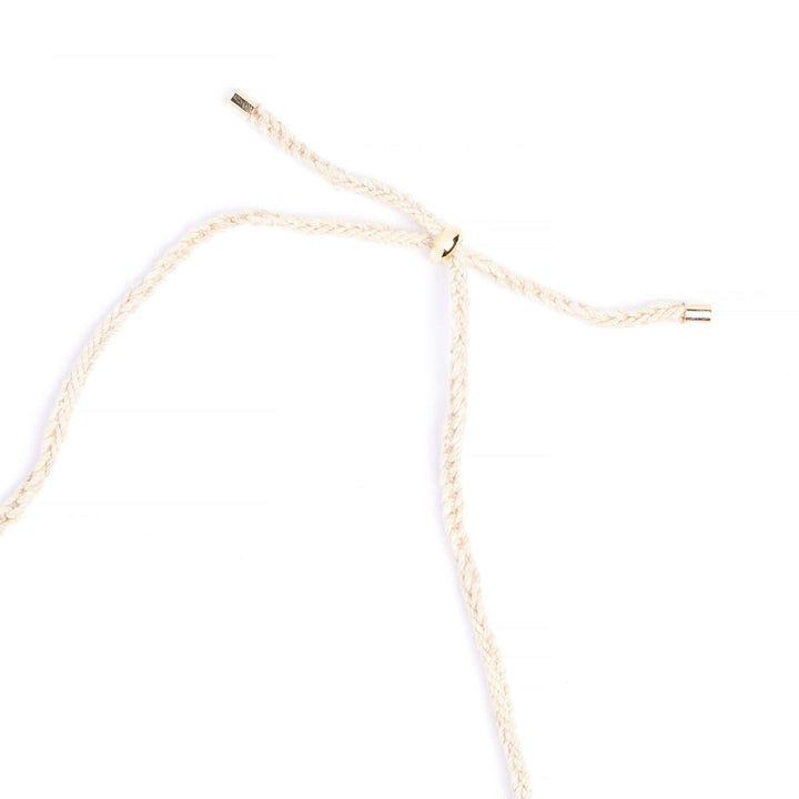 Gold necklace on a white background