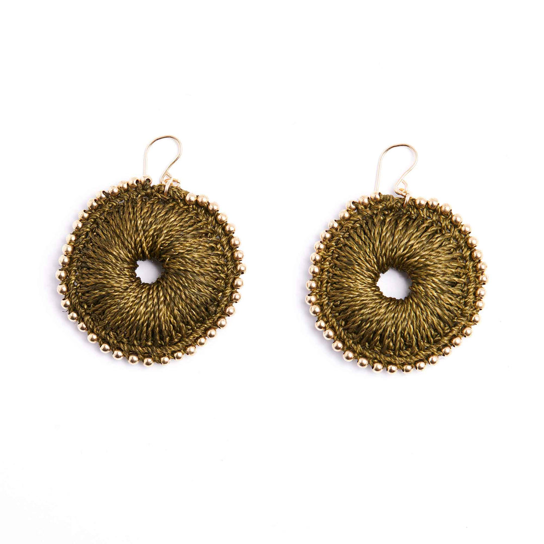 Pair of gold hoop earrings on a white background