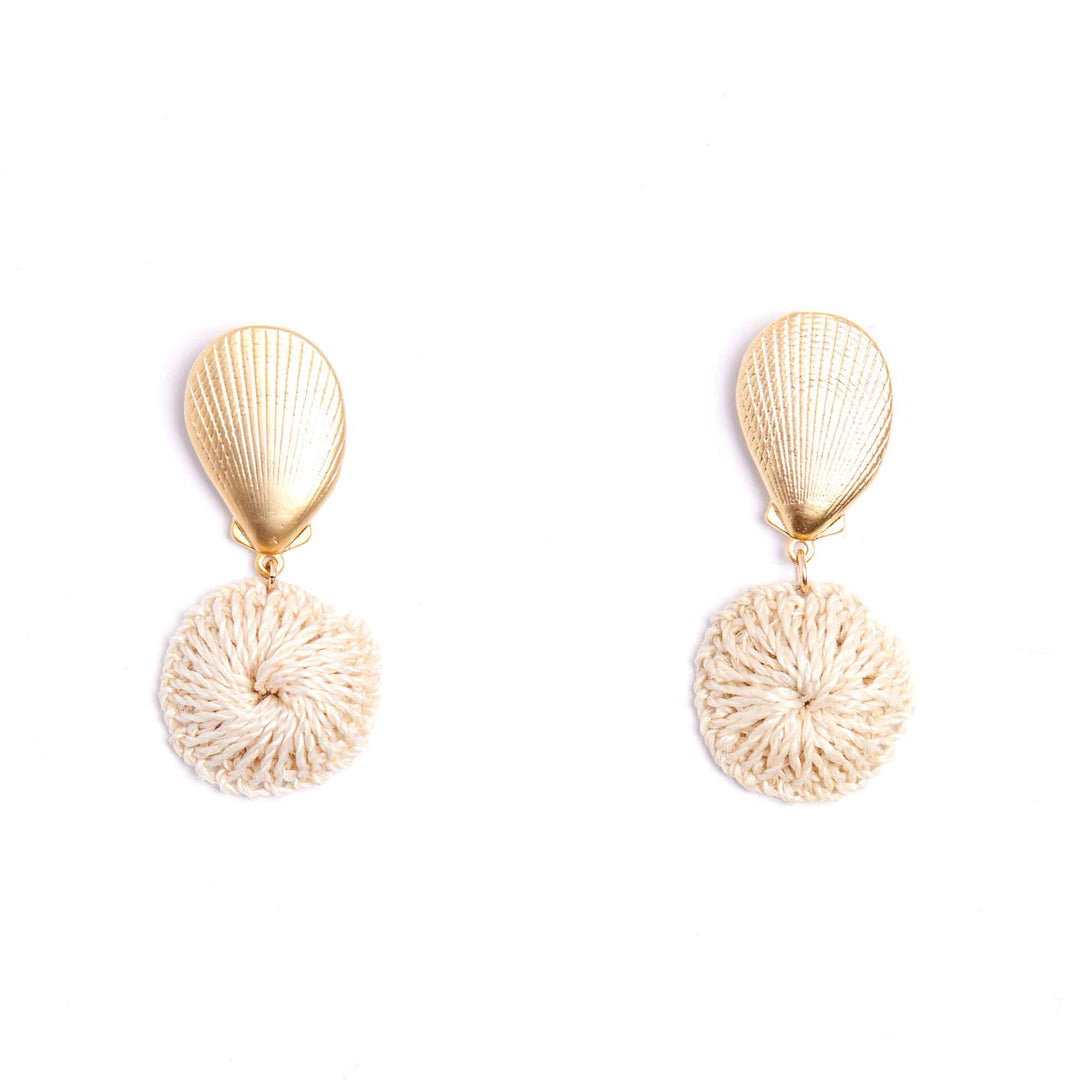 Gold shell and beige textured round earrings on a white background