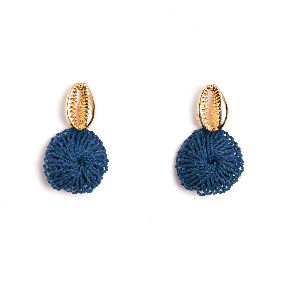 Pair of blue knotted earrings with gold shell-like tops on a white background