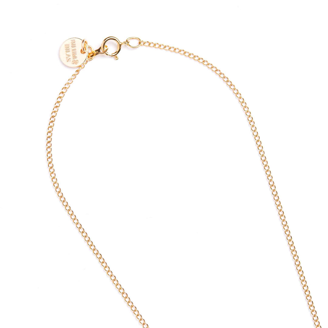 Gold chain bracelet on a white background