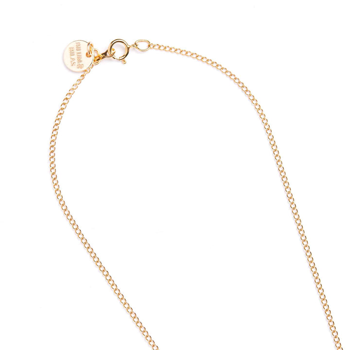 Gold chain bracelet on a white background