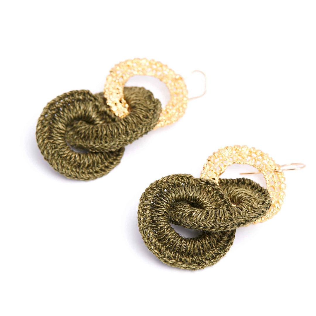 Crocheted earrings with gold loops on a white background