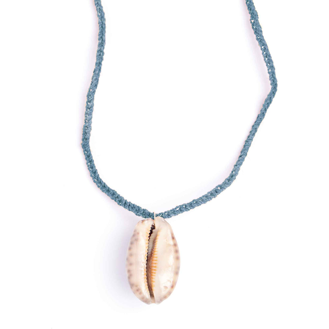 Necklace with a shell pendant on a white background