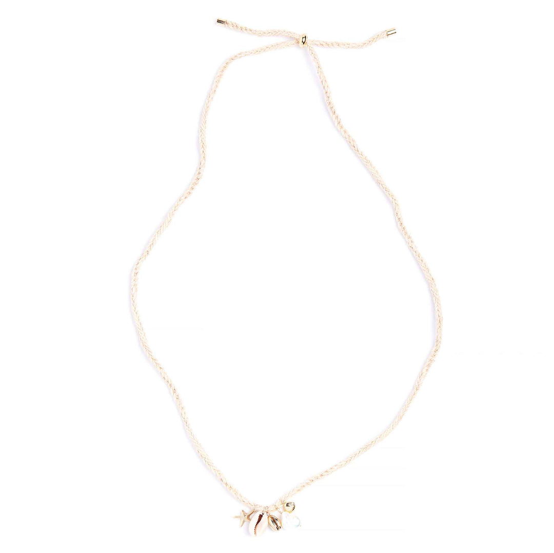 Gold necklace with a small pendant on a white background