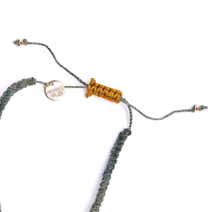 Bracelet with braided design on a white background