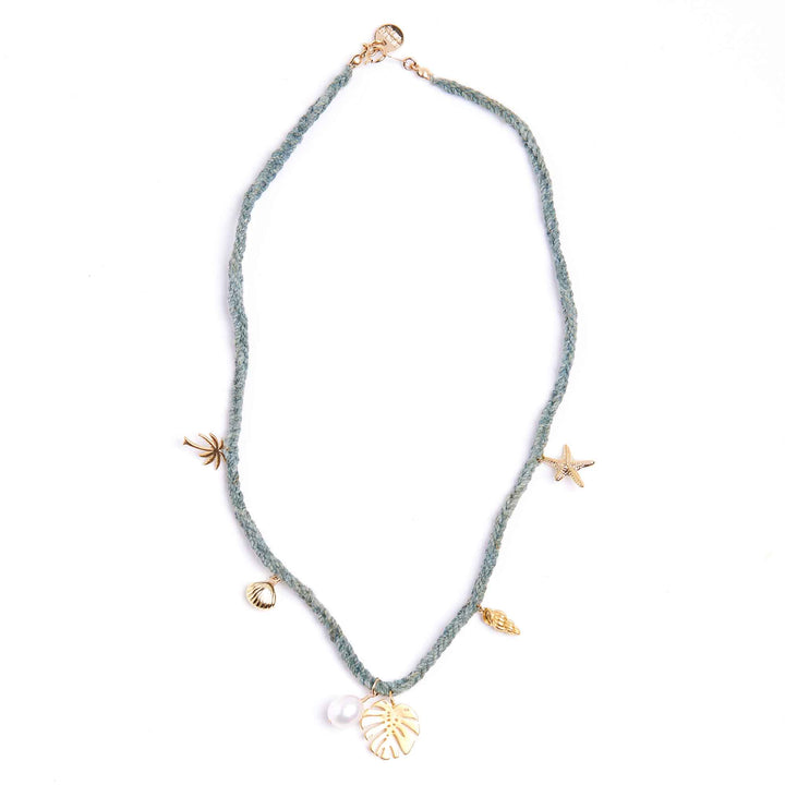 Necklace with starfish, shell, and pearl charms on a white background