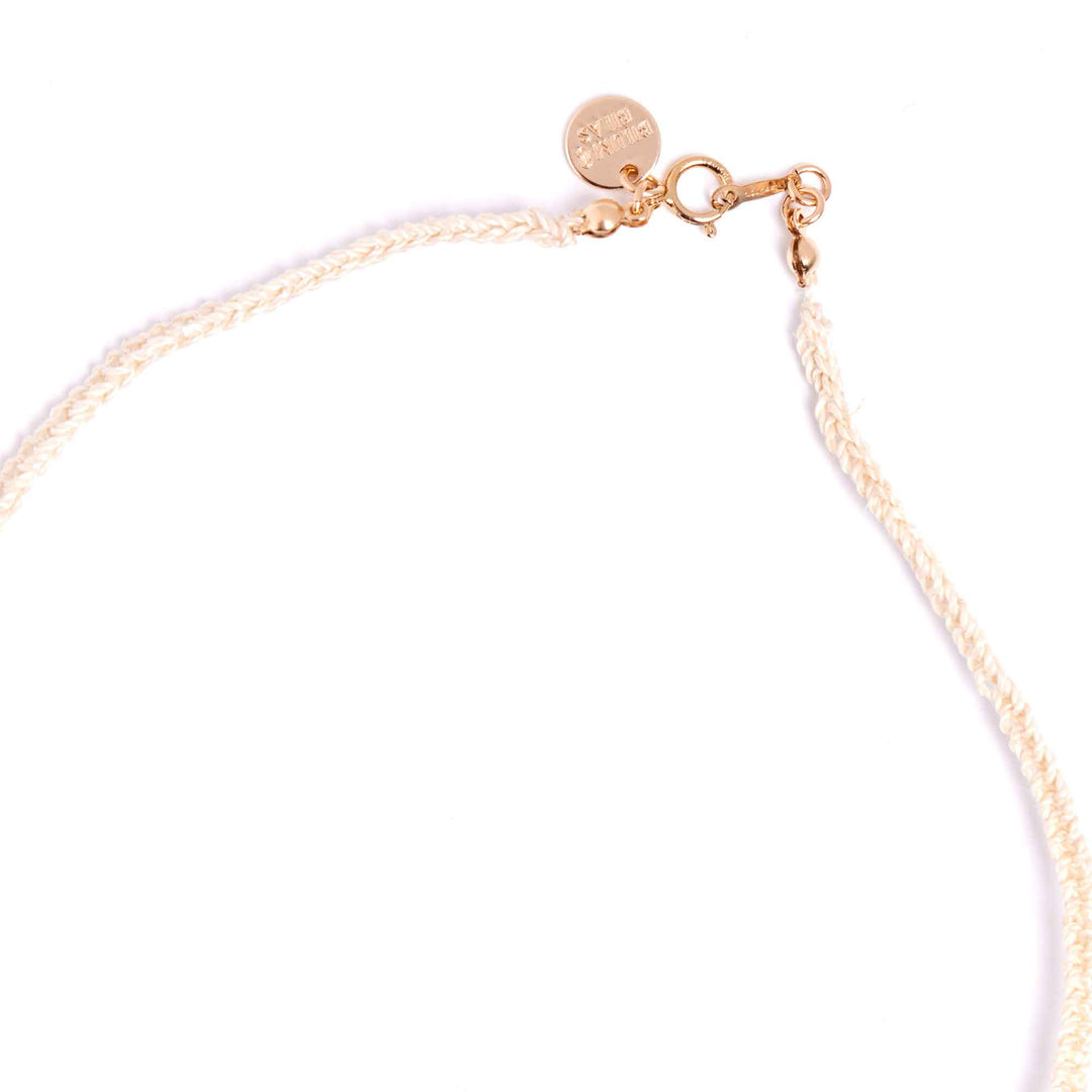 Gold necklace on a white background