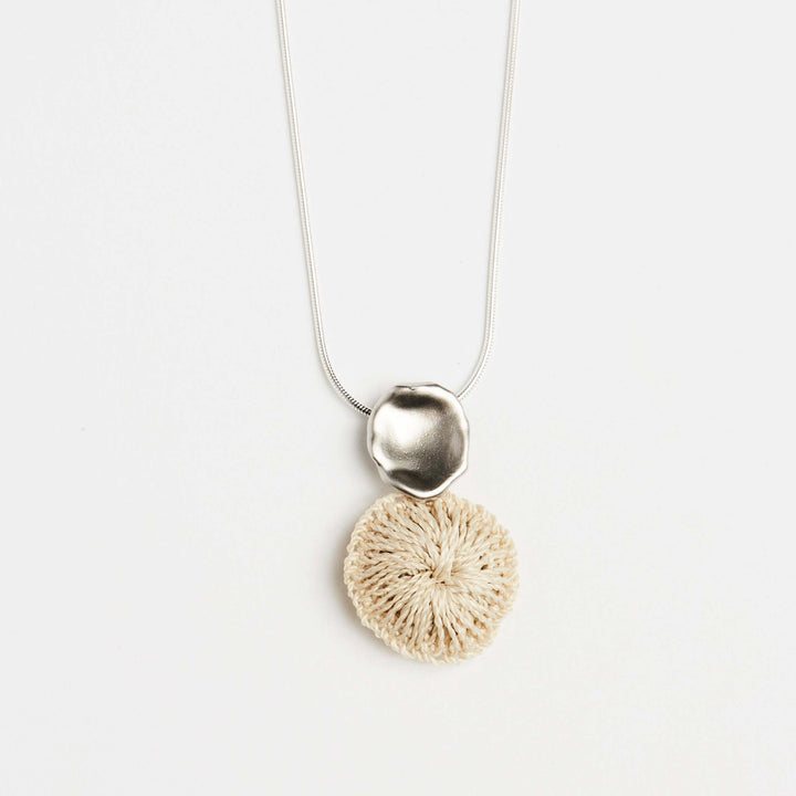 Close up view of Bilum and Bilas sterling silver chain with ethical handwoven natural fibre pendant #Silver