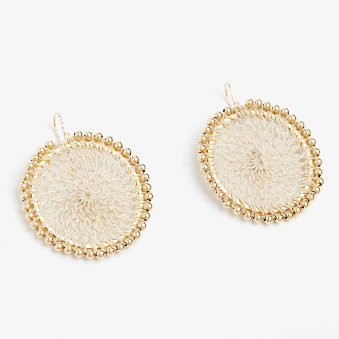 Bilum and Bilas side angle of gold beaded woven disc earrings with ear hooks