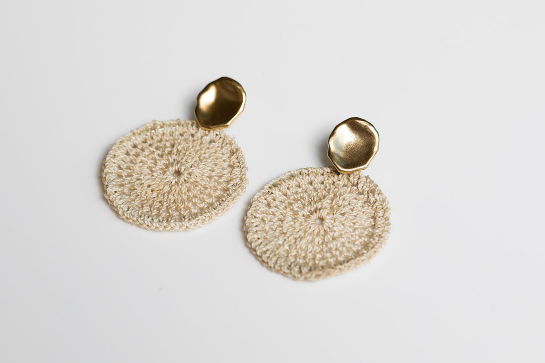 Bilum and Bilas Sowana disc earrings - Crochet woven disc earrings with gold ear post on an angle