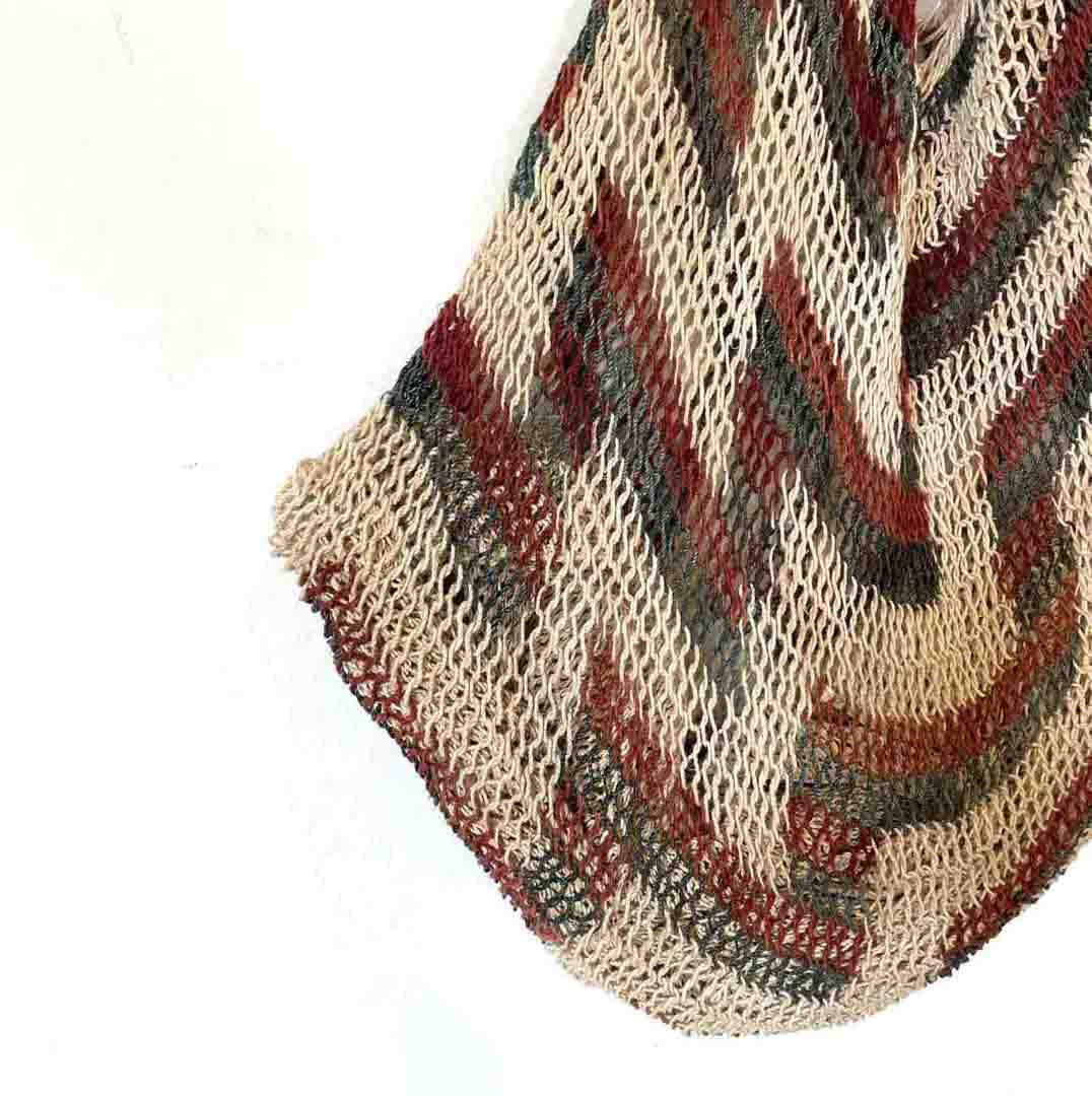 Close up on corner of zig zag patterned string bilum from Morobe Province in Papua New Guinea.