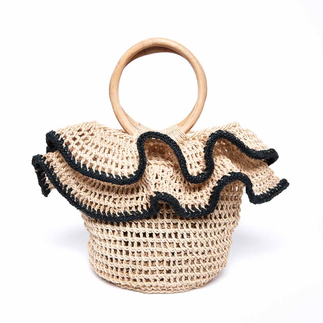 Backside of ripple basket with woven ruffles with black trims.
