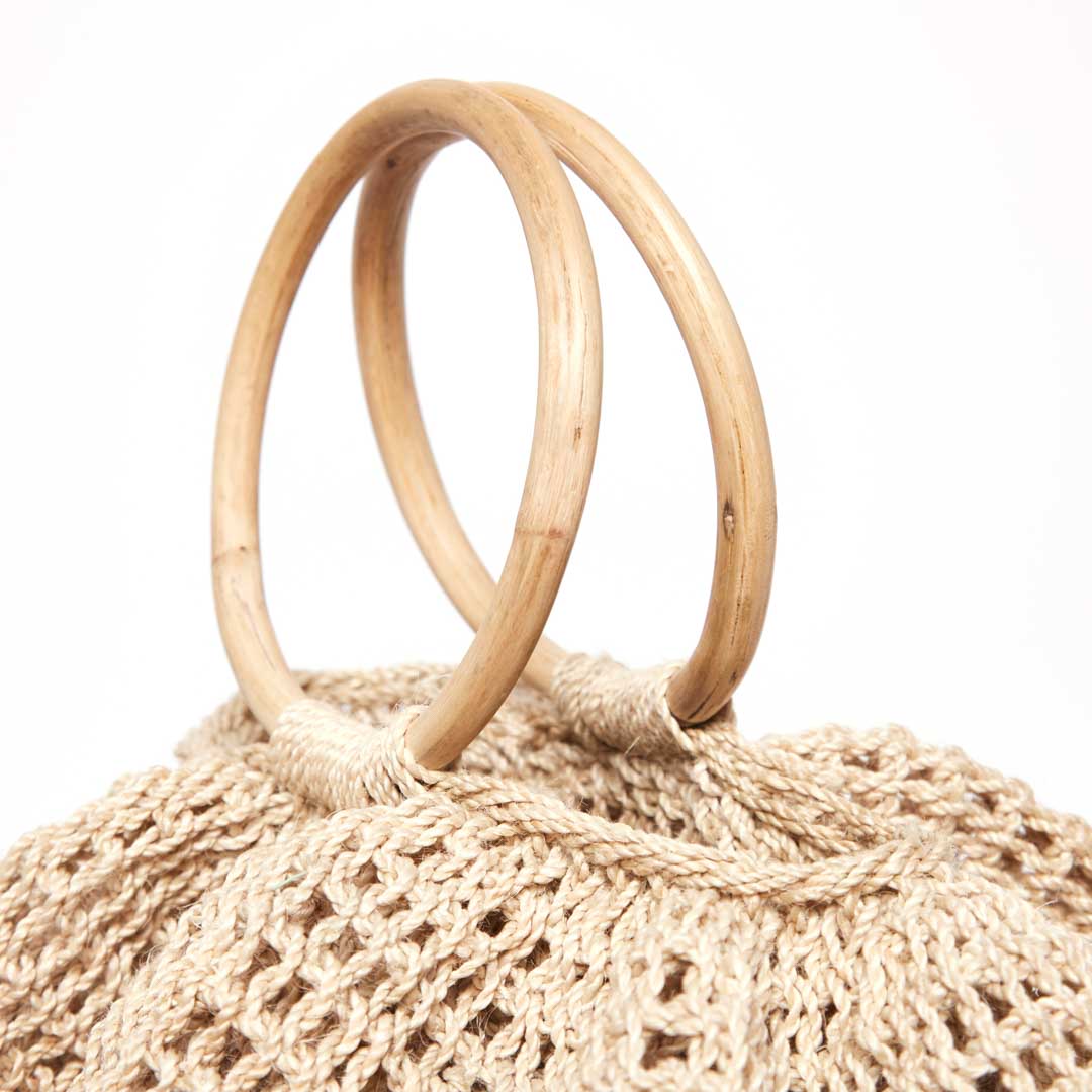 Ripple basket natural cane handle details.
